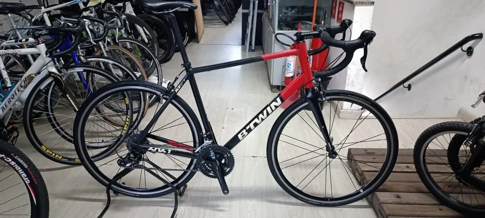 (SEMI NOVA) BICICLETA SPEED ALUM B-TWIN TRIBAN TAM.: 56
